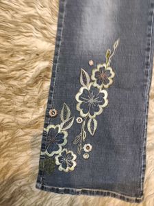 Whimsical Floral Embroidered Denim Jeans