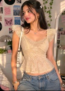 Sheer Lace Peplum Top