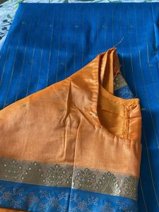 Elegant Orange Saree with Blue Border
