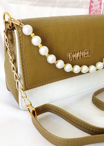 Olive green pearl handle handbag/slingbag