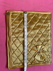 Beautiful golden saree pouches