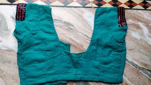 Elegant Teal Saree with Floral Embroidery
