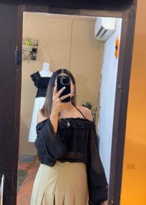 Off-Shoulder Ruffle Black Top with camel skir