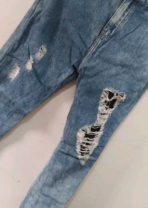 Ripped Blue Denim Jeans