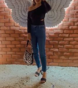 Leather finish cut out off shoulder top