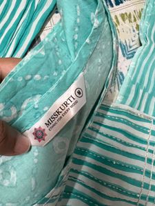 Green and white striped kurta set