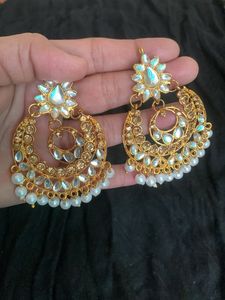 Exquisite Gold Jhumka Earrings with Pearls