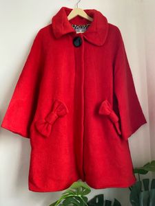 Charming Red Coat with Bow Details