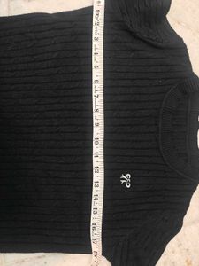 Chic Black Cable Knit Sweater with Bow Detail