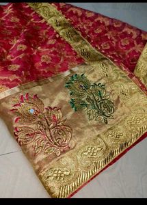 Reddish pink party wear organza tissue silk saree