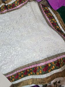 Elegant Off-White Saree with Floral Border
