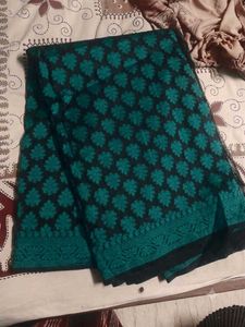 Black and teal green woven saree