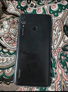 Used Smartphone with Earth Wallpaper