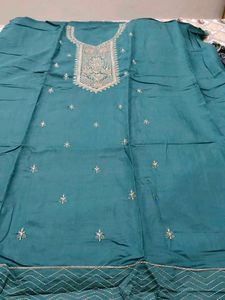 Embroidered Teal suit fabric