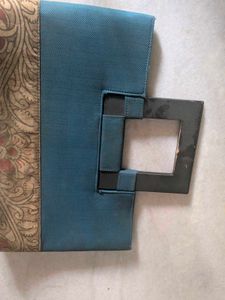 Unique Teal Handbag with Ornate Border