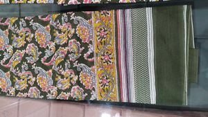olive green cotton suit with lace borde