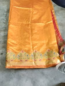Elegant Orange Silk Saree with Floral Border
