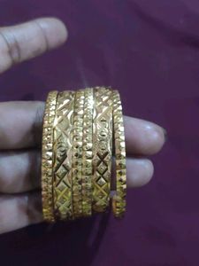 Set of Intricately Designed Gold Bangles