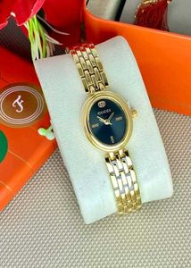 Gucci Gold &amp; Green Watch