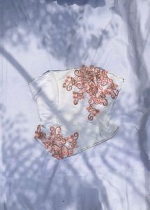 pretty white embroidered corset