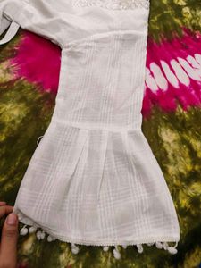 Elegant White Tiered Kurta with Pom-Pom Trim