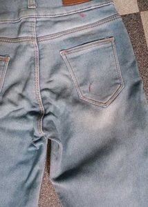 Light Wash Distressed Hem Jeans