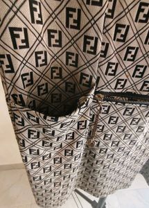 Chic Monogram Print Dress with Zipper Pockets