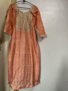Beautiful Peach Suit with Intricate Work