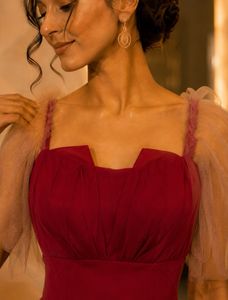 Elegant Red Maxi Dress with Sheer Sleeves