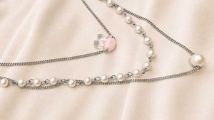 Layered Pearl &amp; Charm Necklace