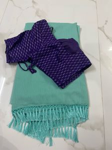 Elegant Turquoise Saree with Purple Blouse