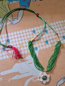 Multi Layered Cute Green Beats Mala With Locket