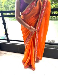 Vibrant Orange Embroidered Saree