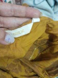A mustard yellow anarkali kurta
