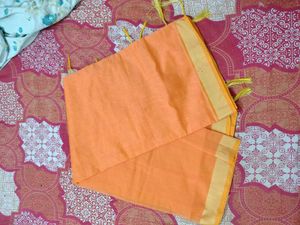 Orange Saree with Yellow Tassels