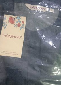 Denim shirt with floral tag