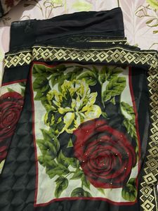 Elegant Black Saree with Gold Border