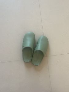 Mint Green Slides Nike brand.
