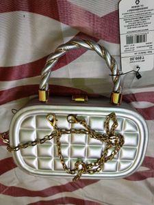 Elegant Silver Textured Clutch with Chain