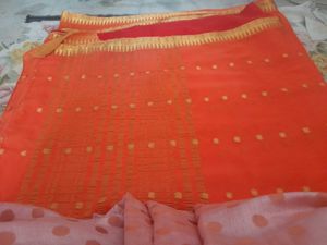 Vibrant Orange Saree with Golden