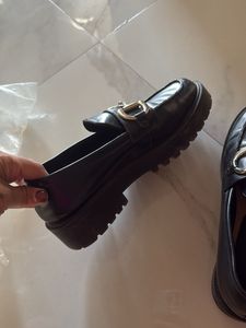 Classic Black Loafers with Gold Buckle