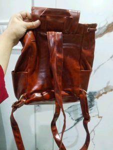 Brown leather backpack
