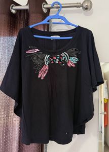 Embellished Black T-Shirt with Unique Design