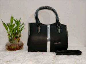Chic Black Handbag with Silver Accent