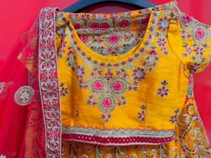 Exquisite Yellow &amp; Red Embroidered Lehenga Choli