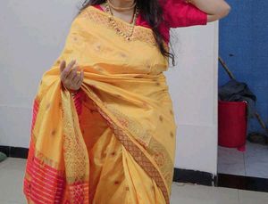 Elegant Yellow Silk Saree with Pink Border
