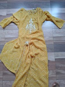 Elegant Yellow Kurta with White Embroidery