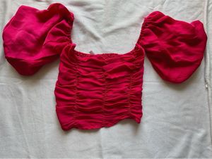 magenta tube top with puffy bell sleeves