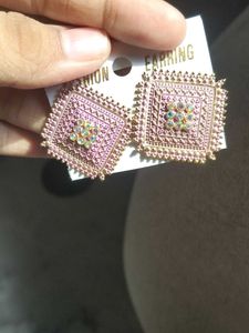pink studs or earings