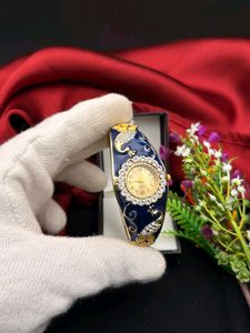 Elegant Peacock Bangle Watch